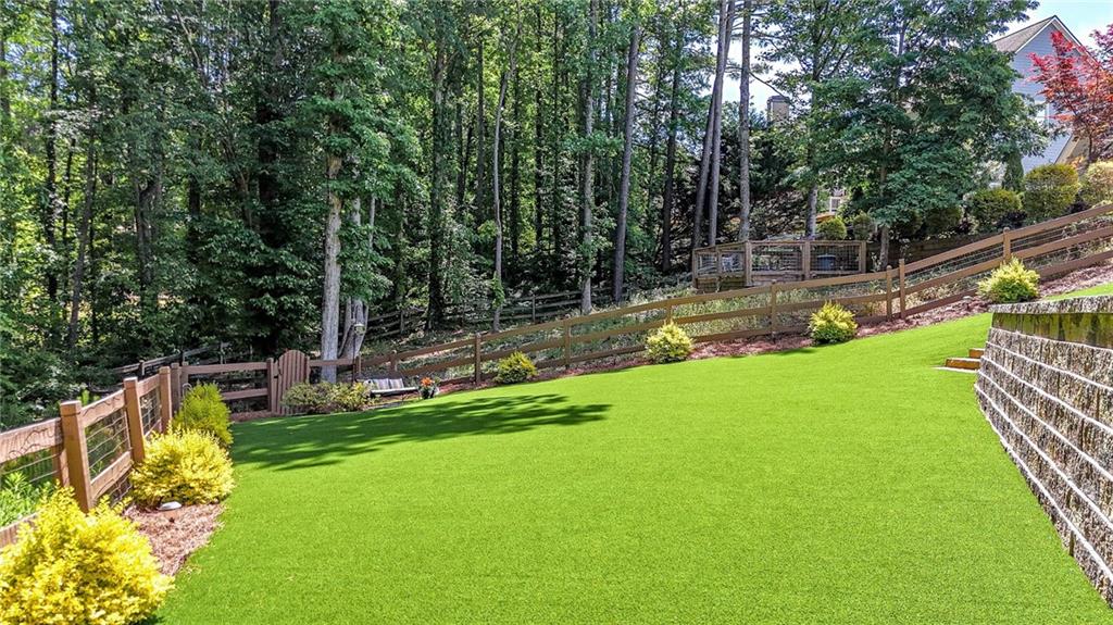 22 Turtle Rock Place Acworth, GA 30101 - Photo 64 of 70 a view of a backyard with swimming pool