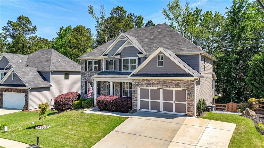 22 Turtle Rock Place Acworth, GA 30101 - Photo 68 of 70 a front view of a house with garden