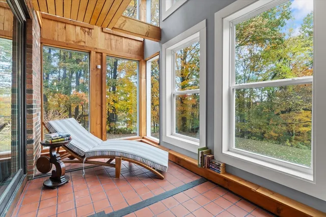 a view of a room with a large window