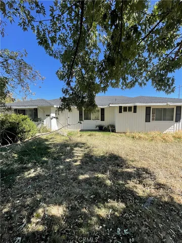 a view of house with outdoor space