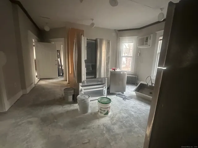 a view of an entryway with a livingroom