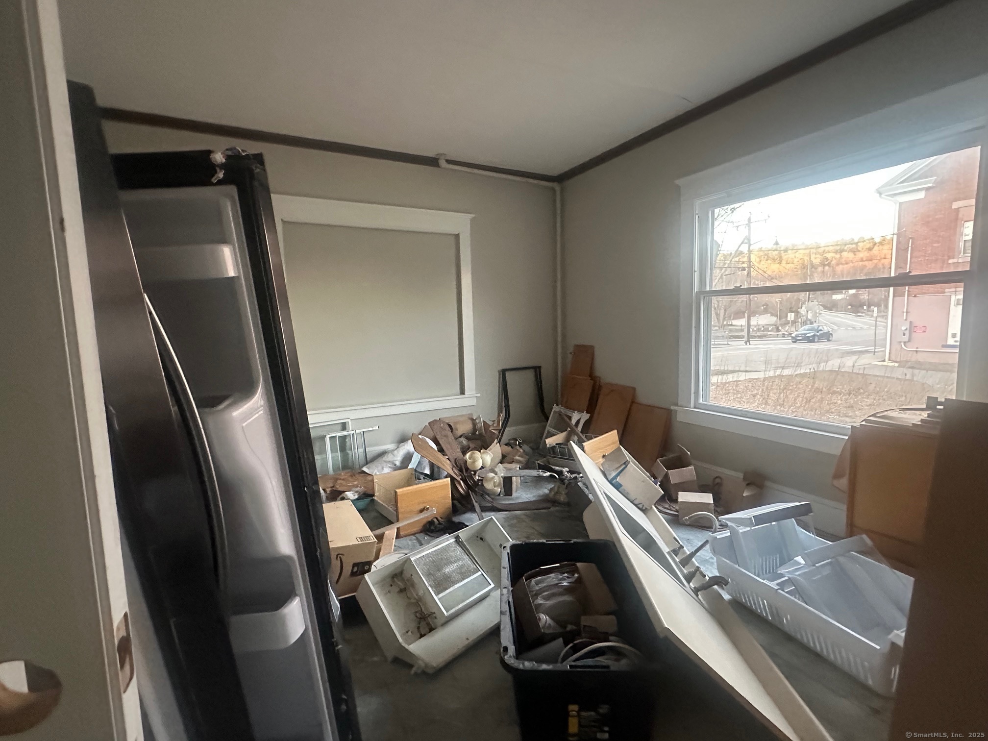 12 West Main Street Sprague, CT 06330 - Photo 18 of 35 a living room with furniture and a window