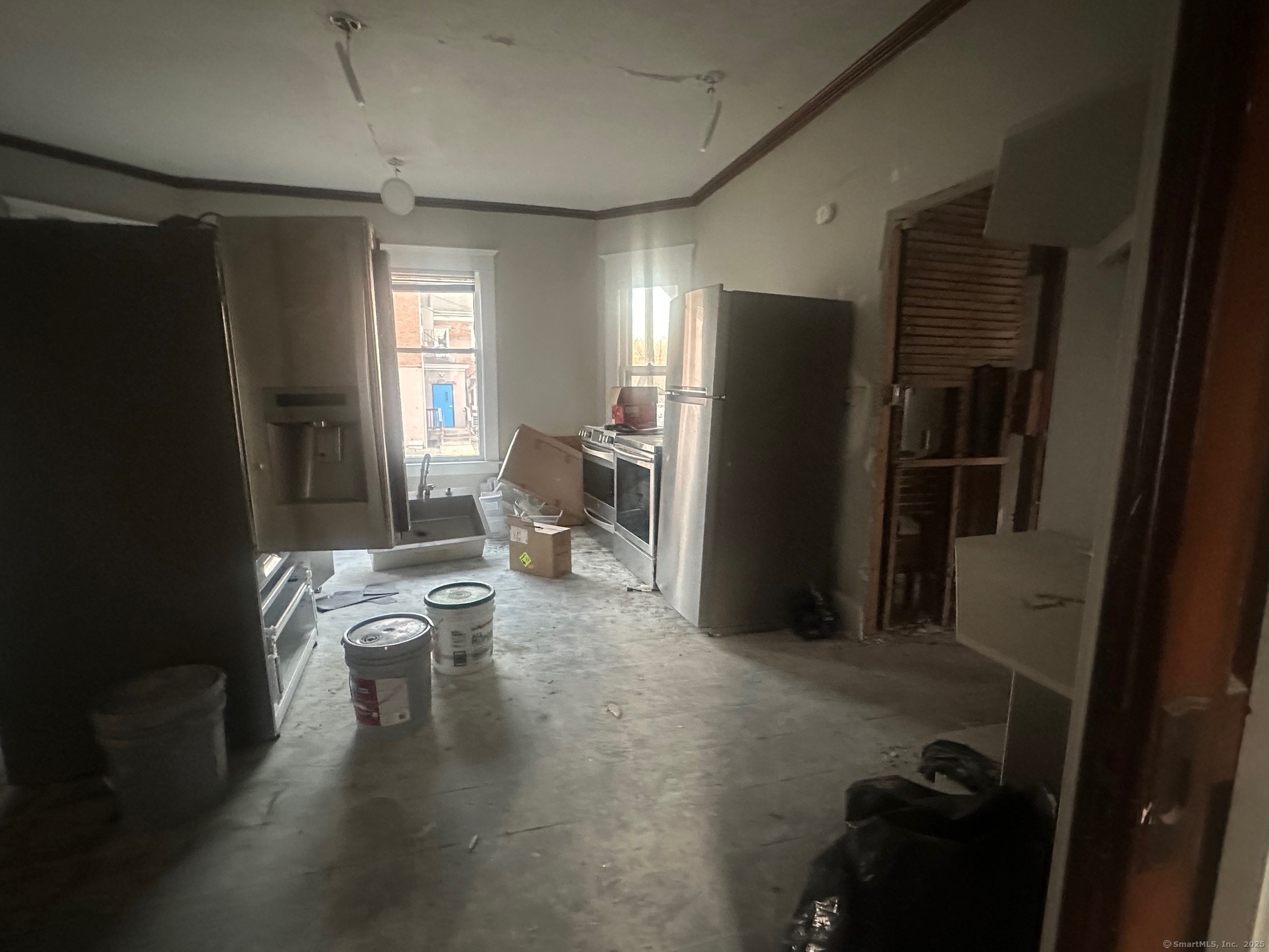 12 West Main Street Sprague, CT 06330 - Photo 23 of 35 a living room with furniture and a window
