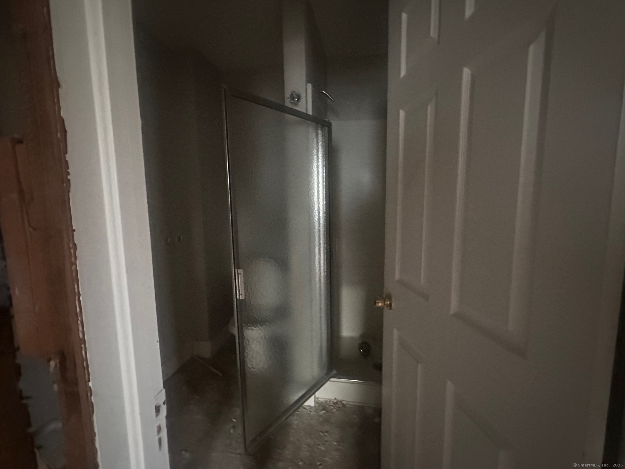 12 West Main Street Sprague, CT 06330 - Photo 24 of 35 a bathroom with a glass shower door