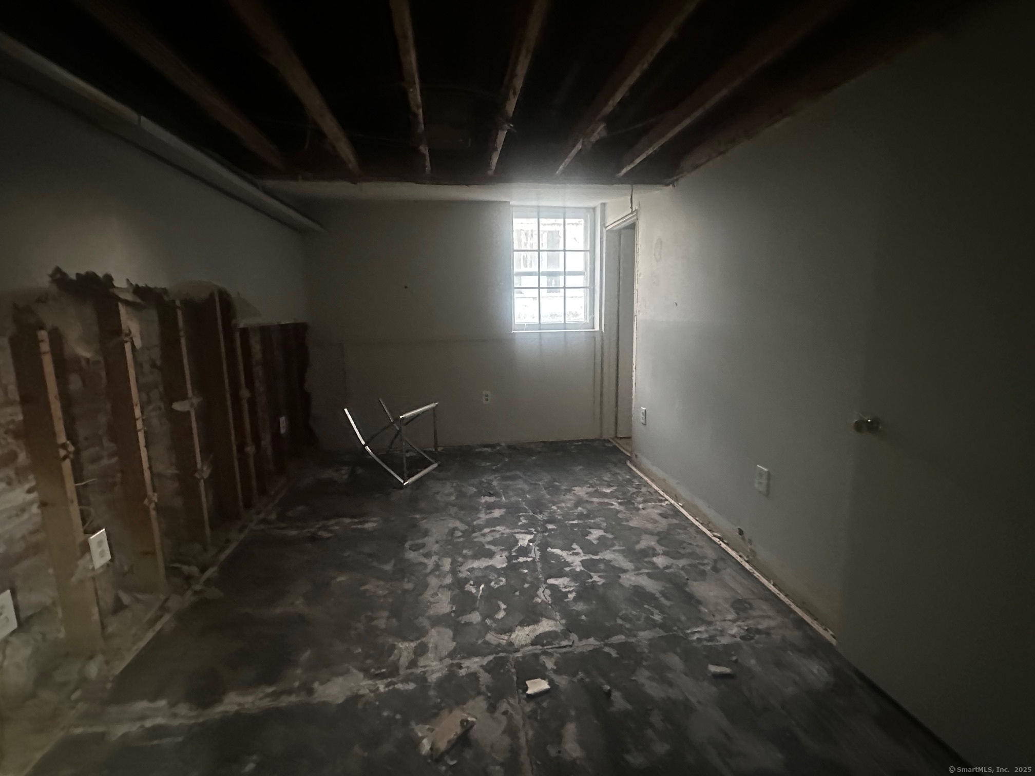 12 West Main Street Sprague, CT 06330 - Photo 31 of 35 a view of a livingroom with wooden floor and a window