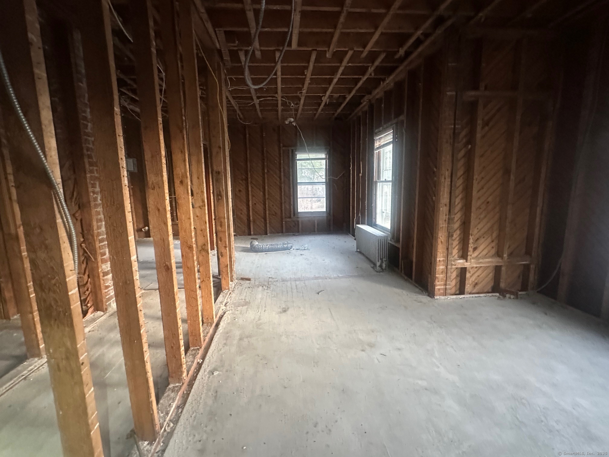 12 West Main Street Sprague, CT 06330 - Photo 10 of 35 a view of a room with wooden walls