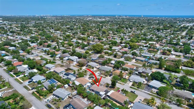 an aerial view of a city with lots of residential buildings