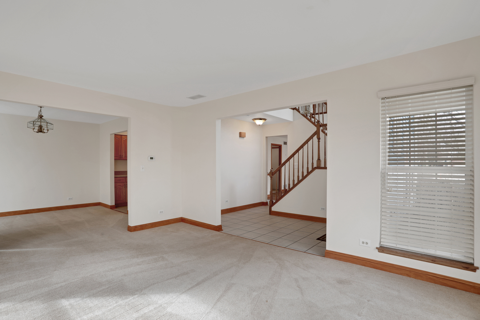 1240 Coldspring Road Elgin, IL 60120 - Photo 9 of 17 a view of an empty room with a window