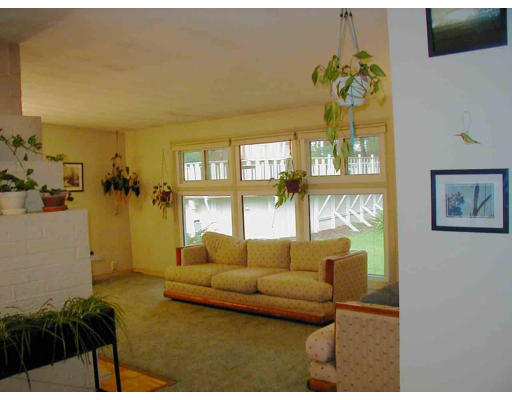 20 Parlee Road Chelmsford, MA 01824 - Photo 3 of 4 a living room with furniture and a large window