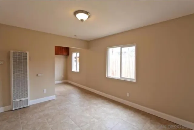 an empty room with windows