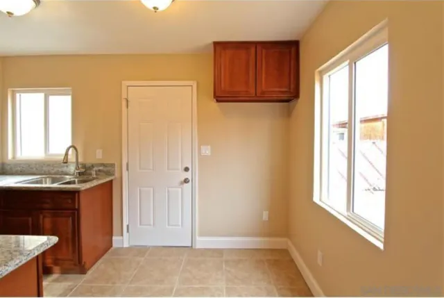 a view of a kitchen with a window