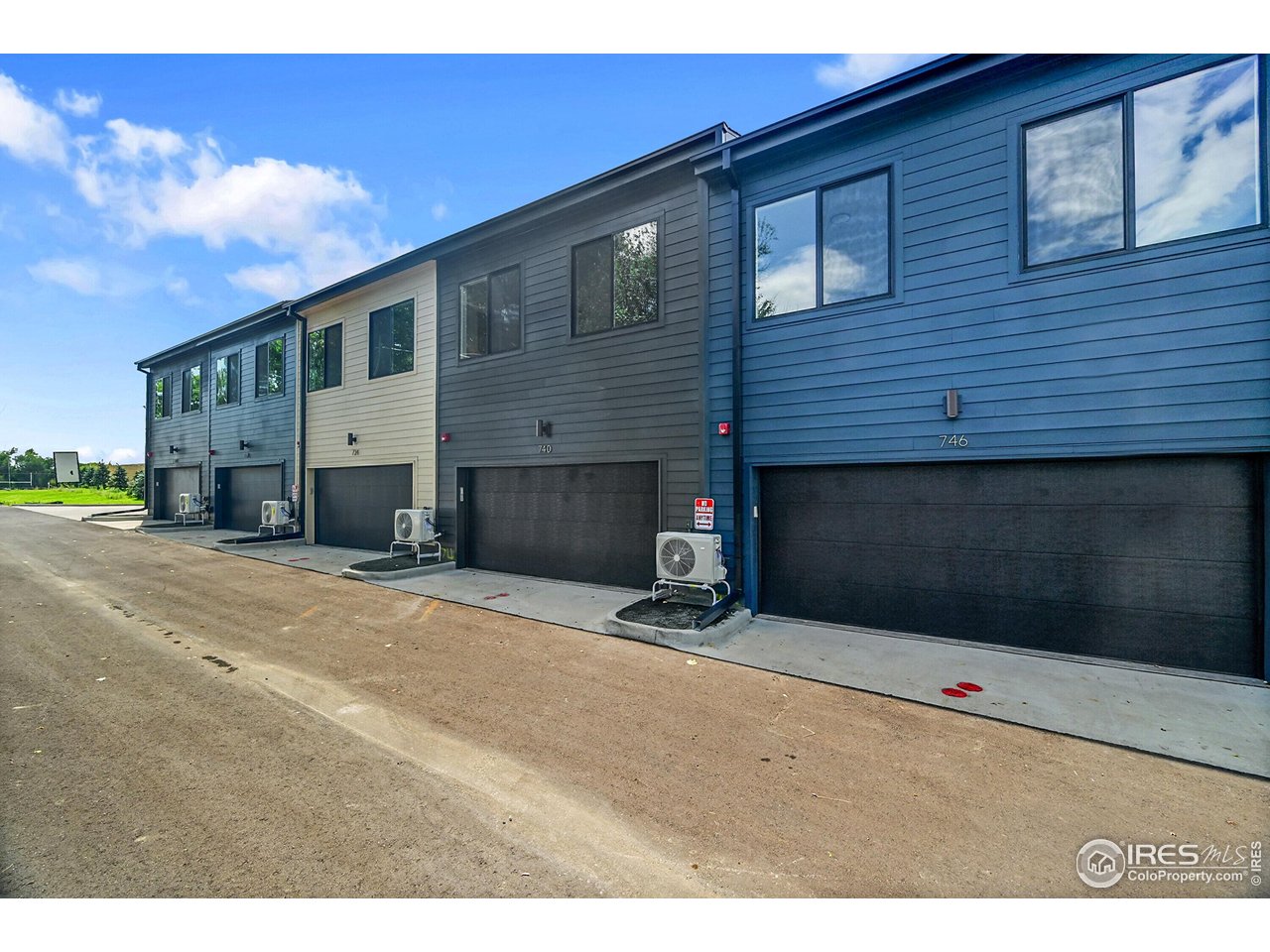 777 East County Line Road Erie, CO 80516 - Photo 15 of 15 a front view of a house with a yard