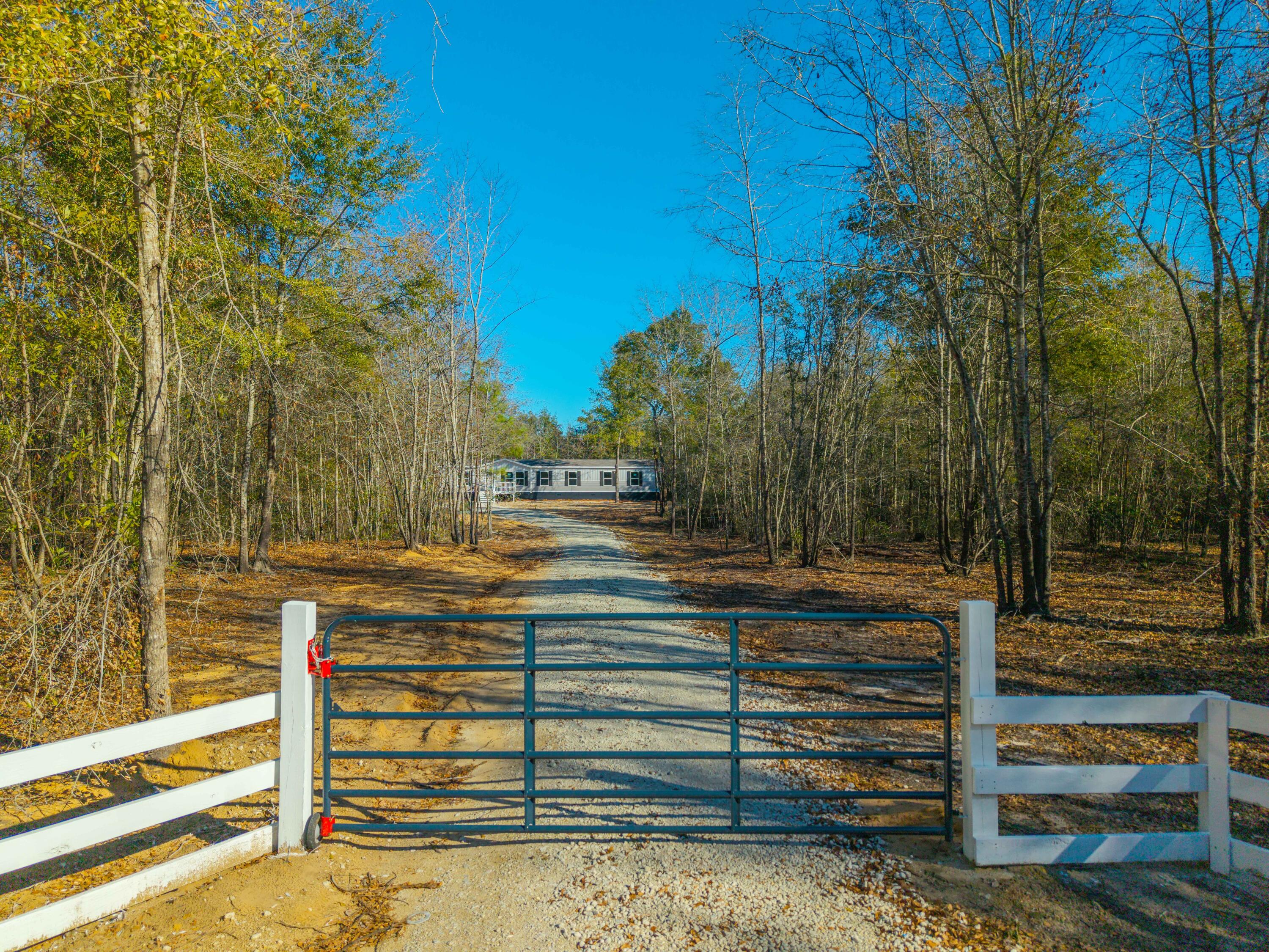 818 Pigeon Bay Road Cross, SC 29436 - Photo 3 of 42 DJI_20250116144217_0165_D