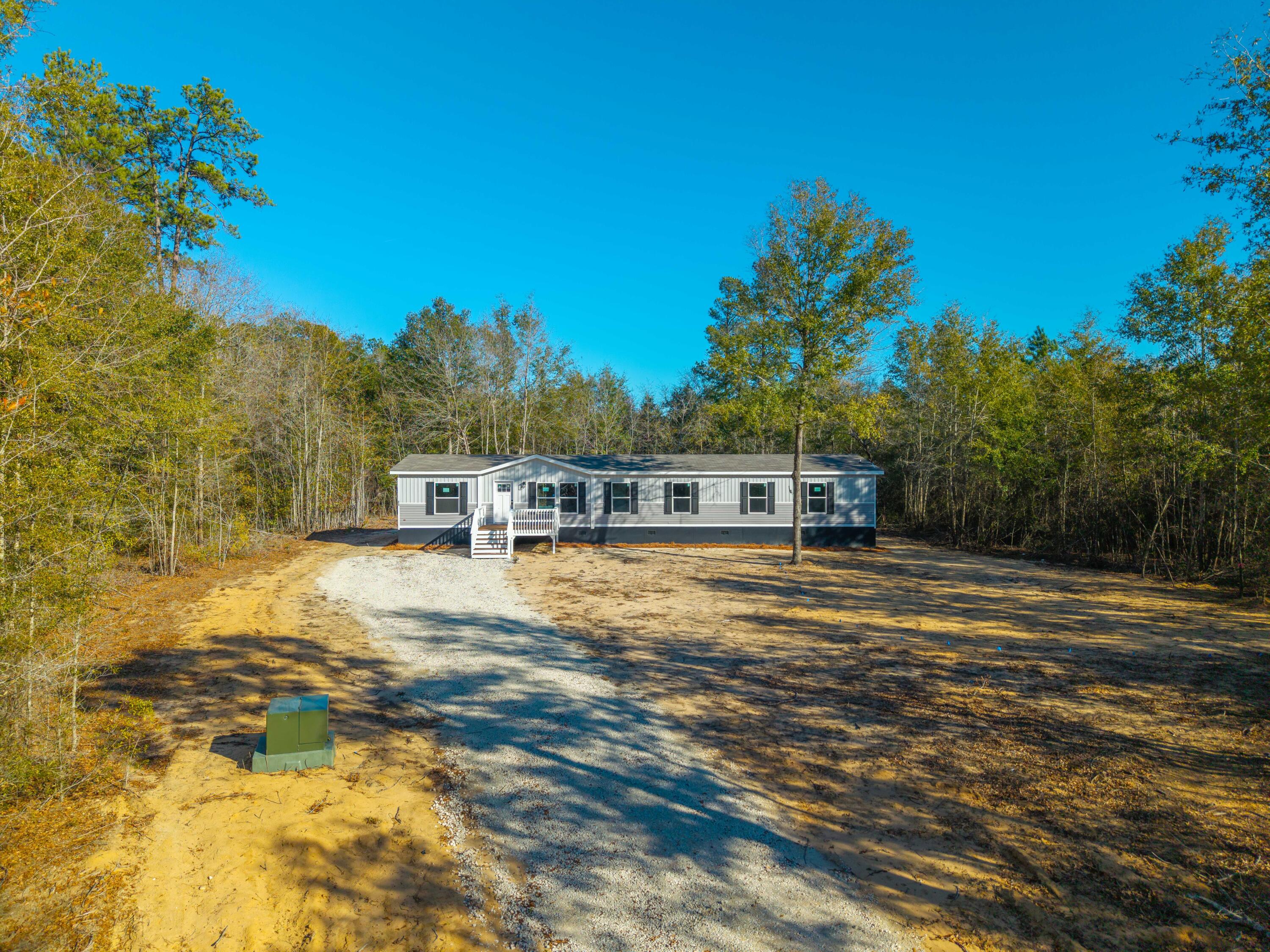 818 Pigeon Bay Road Cross, SC 29436 - Photo 4 of 42 DJI_20250116144245_0166_D