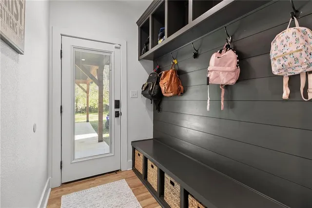 a kitchen with a cabinets and chandelier
