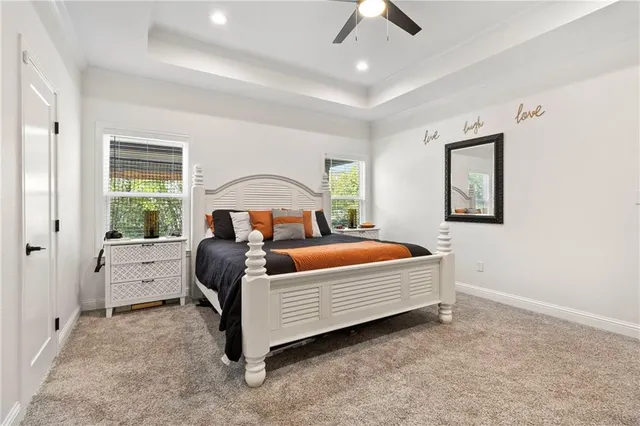 a bed room with a bed and a window