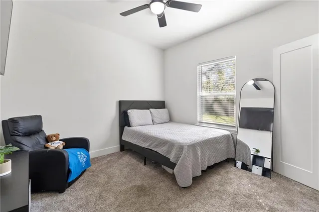 a bathroom with a sink vanity and a mirror