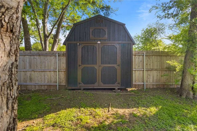 a view of a house with a big yard