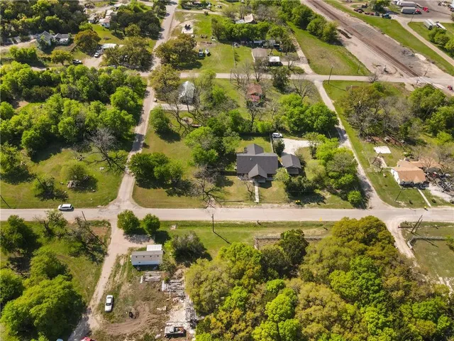 a view of a house with swimming pool