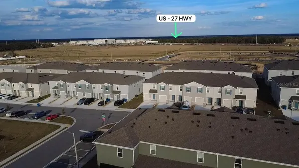 a view of a pool with an outdoor space