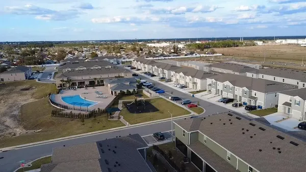 a view of a city with an ocean