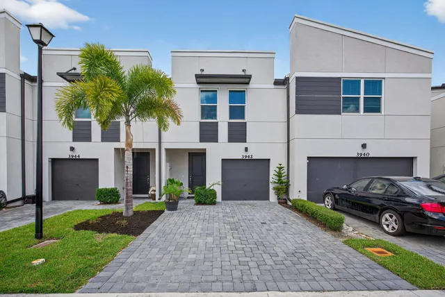 a house view with a garden space