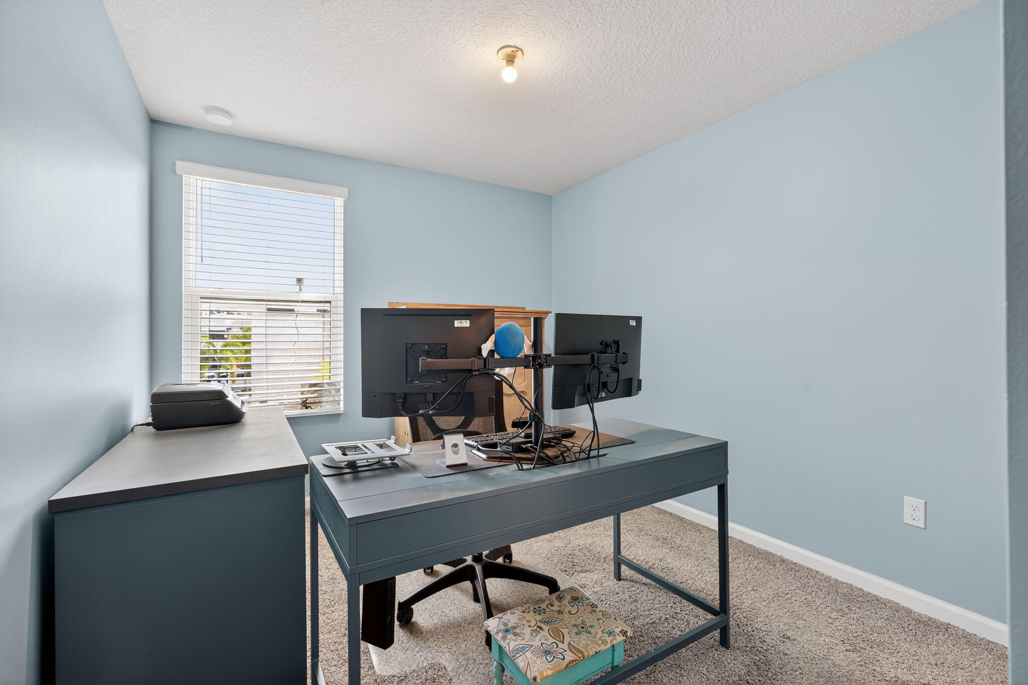 3942 Southeast Caladium Court Stuart, FL 34997 - Photo 28 of 38 a view of a workspace with furniture