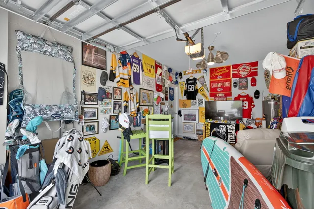 a view of a chairs and table in the balcony