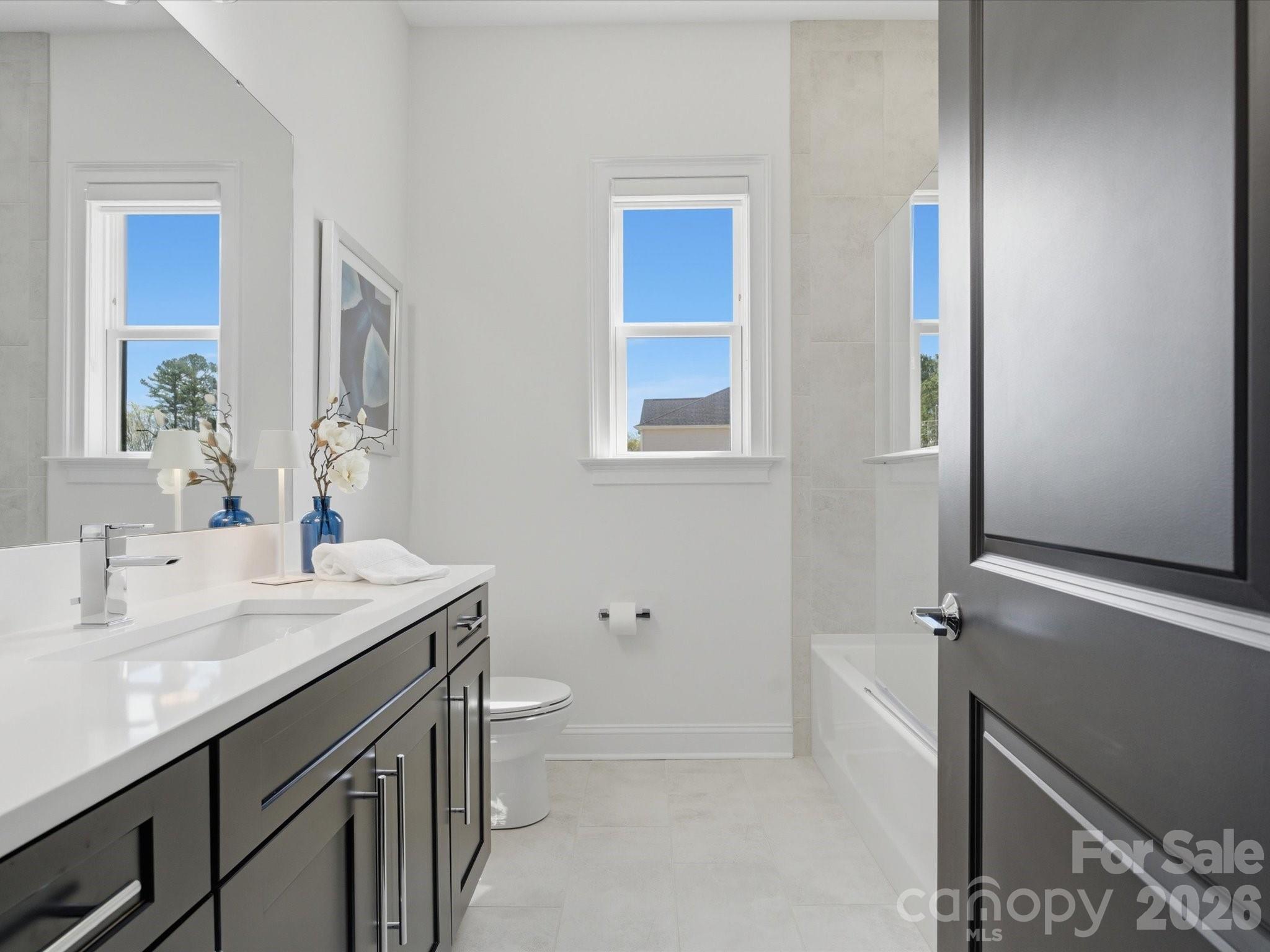 7237 Twelve Mile Creek Road Lancaster, SC 29720 - Photo 22 of 47 a bathroom with a sink a toilet and shower