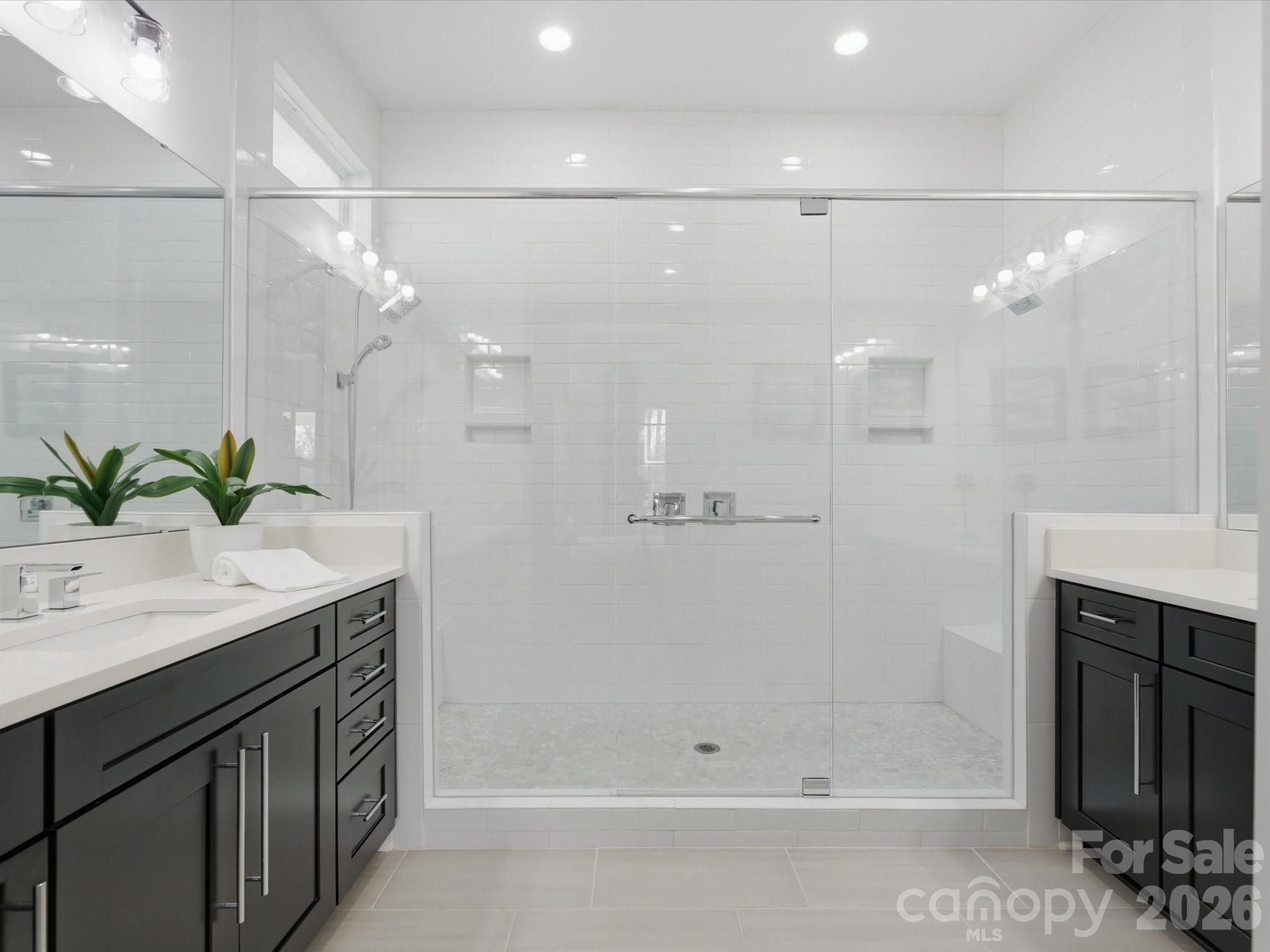 7237 Twelve Mile Creek Road Lancaster, SC 29720 - Photo 26 of 47 a bathroom with a shower sink and mirror