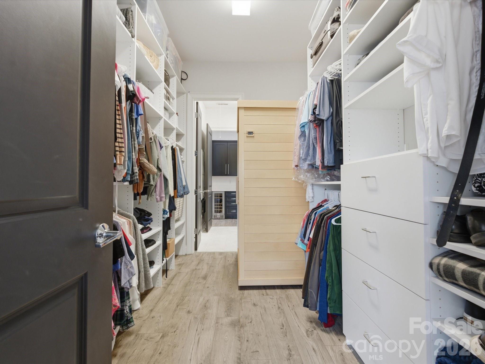 7237 Twelve Mile Creek Road Lancaster, SC 29720 - Photo 28 of 47 a view of walk in closet with clothes and shoes