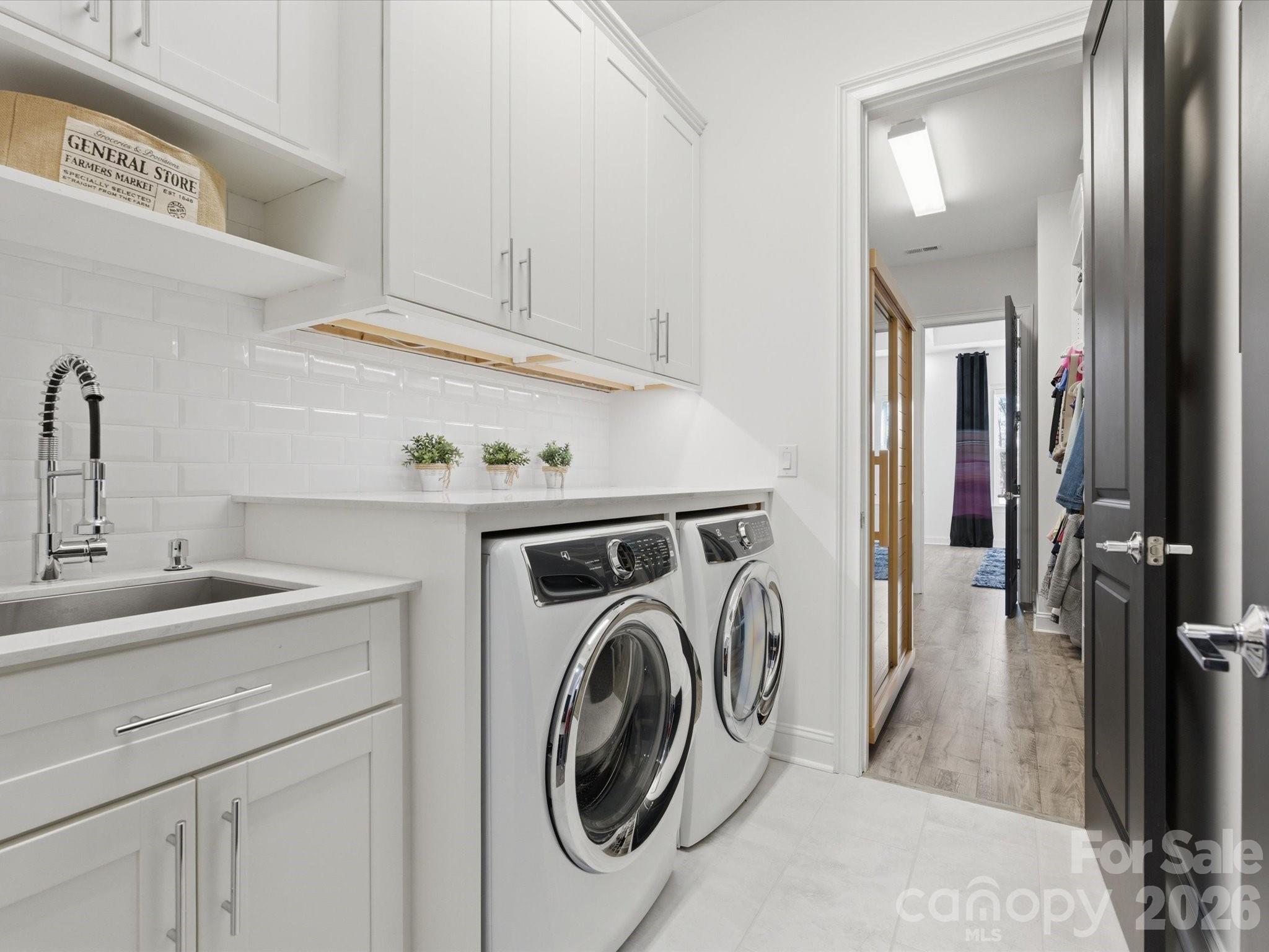 7237 Twelve Mile Creek Road Lancaster, SC 29720 - Photo 29 of 47 a utility room with sink dryer and washer