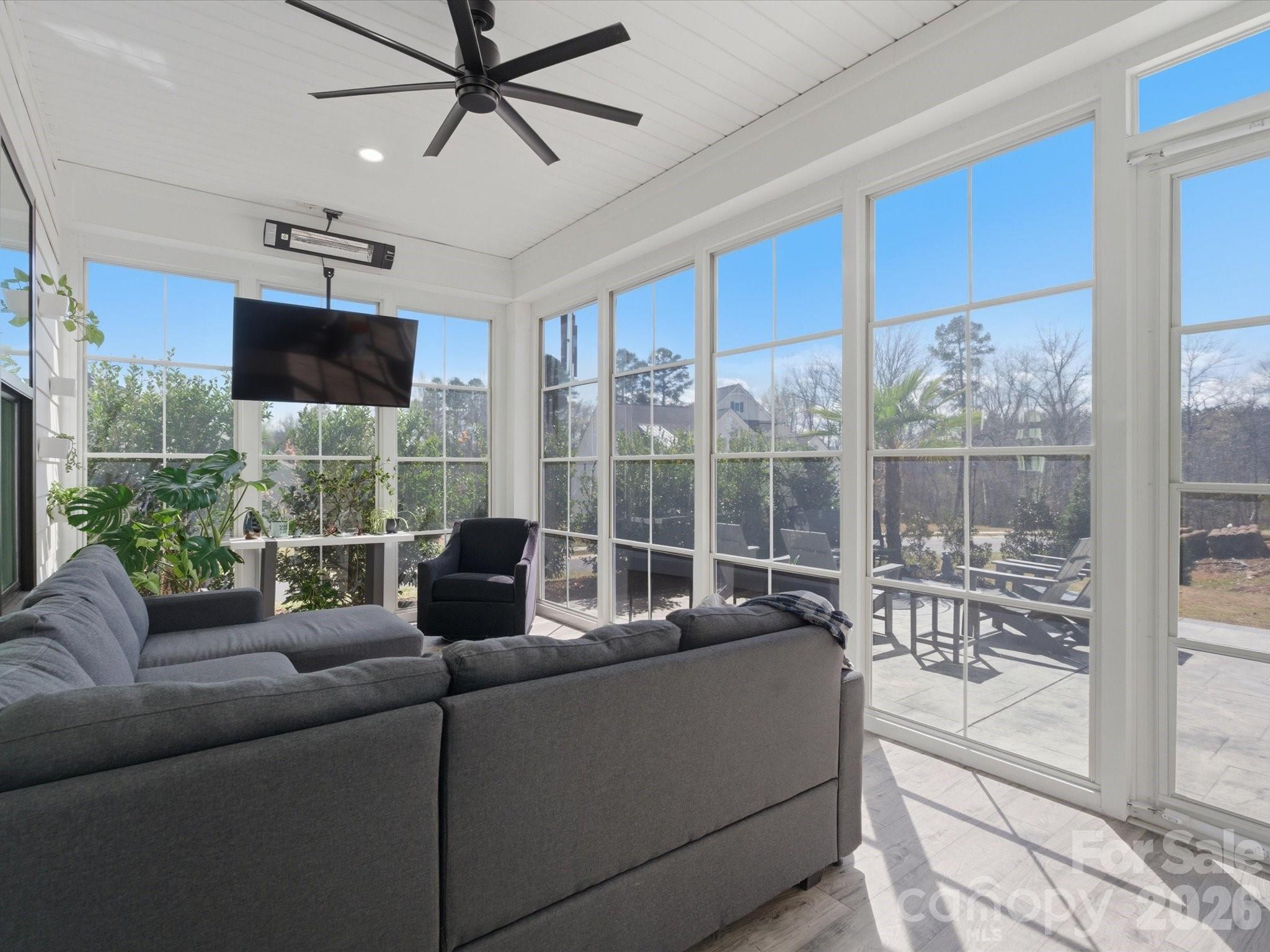 7237 Twelve Mile Creek Road Lancaster, SC 29720 - Photo 34 of 47 a living room with furniture tv and a large window
