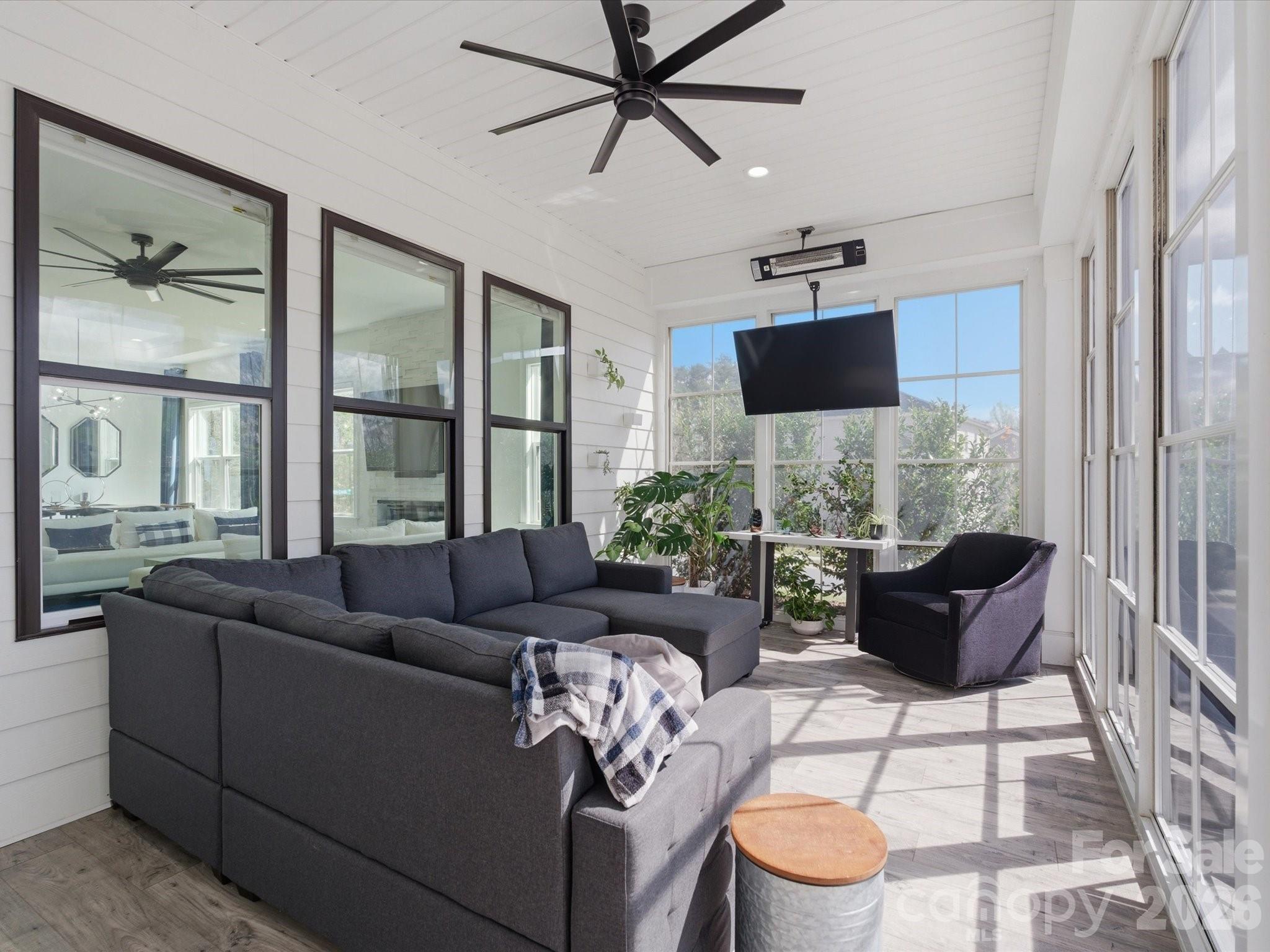 7237 Twelve Mile Creek Road Lancaster, SC 29720 - Photo 35 of 47 a living room with furniture and a large window