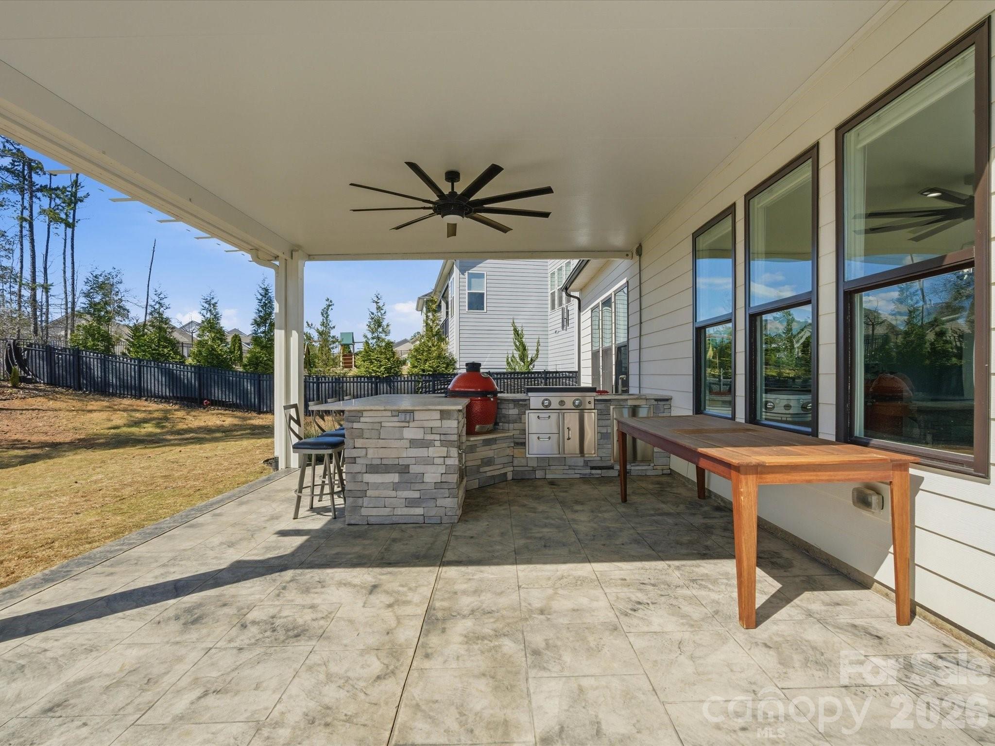7237 Twelve Mile Creek Road Lancaster, SC 29720 - Photo 37 of 47 a living room with patio furniture and a large window