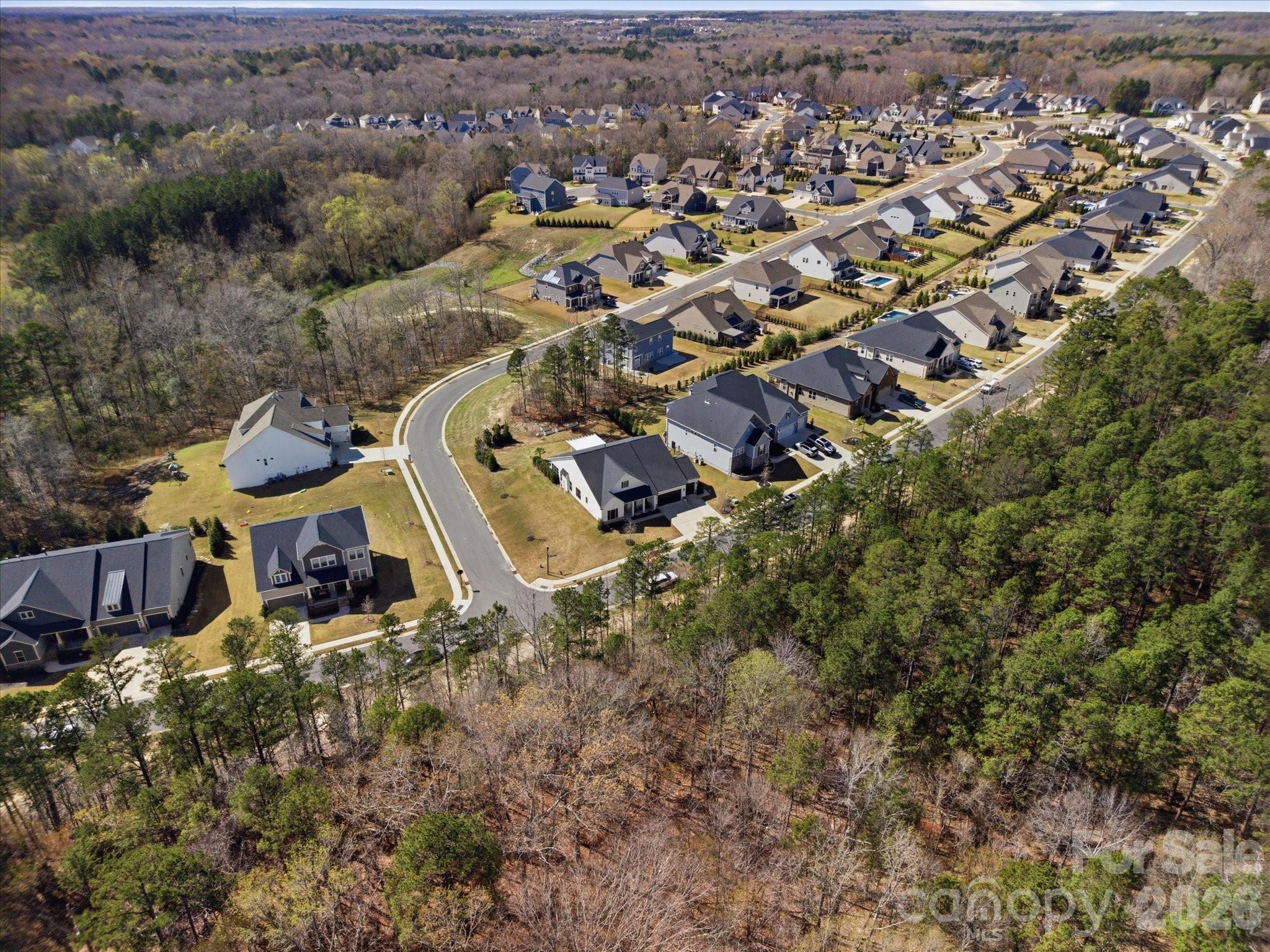 7237 Twelve Mile Creek Road Lancaster, SC 29720 - Photo 44 of 47 an aerial view of a house with a yard and lake view