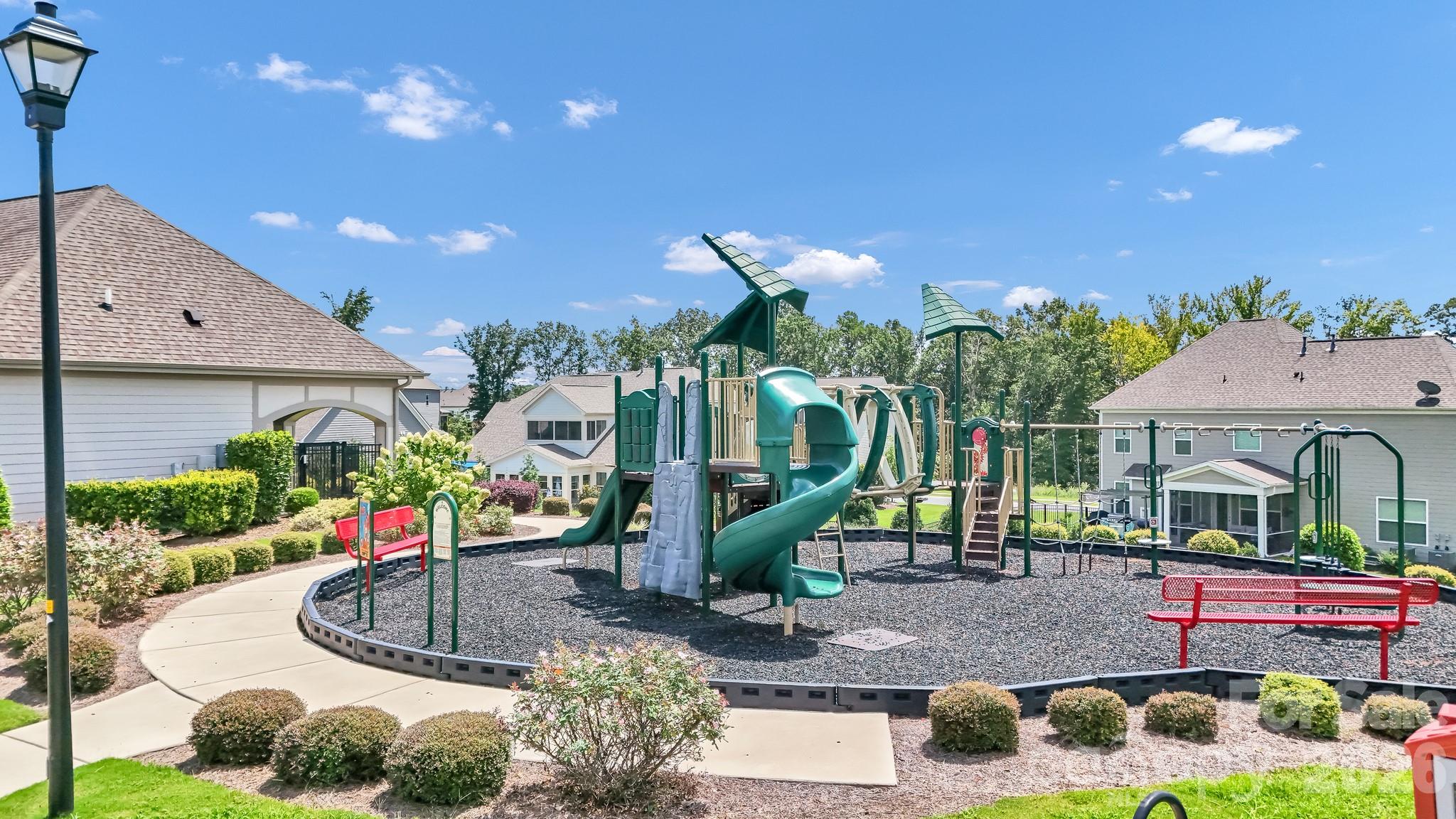 7237 Twelve Mile Creek Road Lancaster, SC 29720 - Photo 46 of 47 a swimming pool with barbeque oven outdoor seating