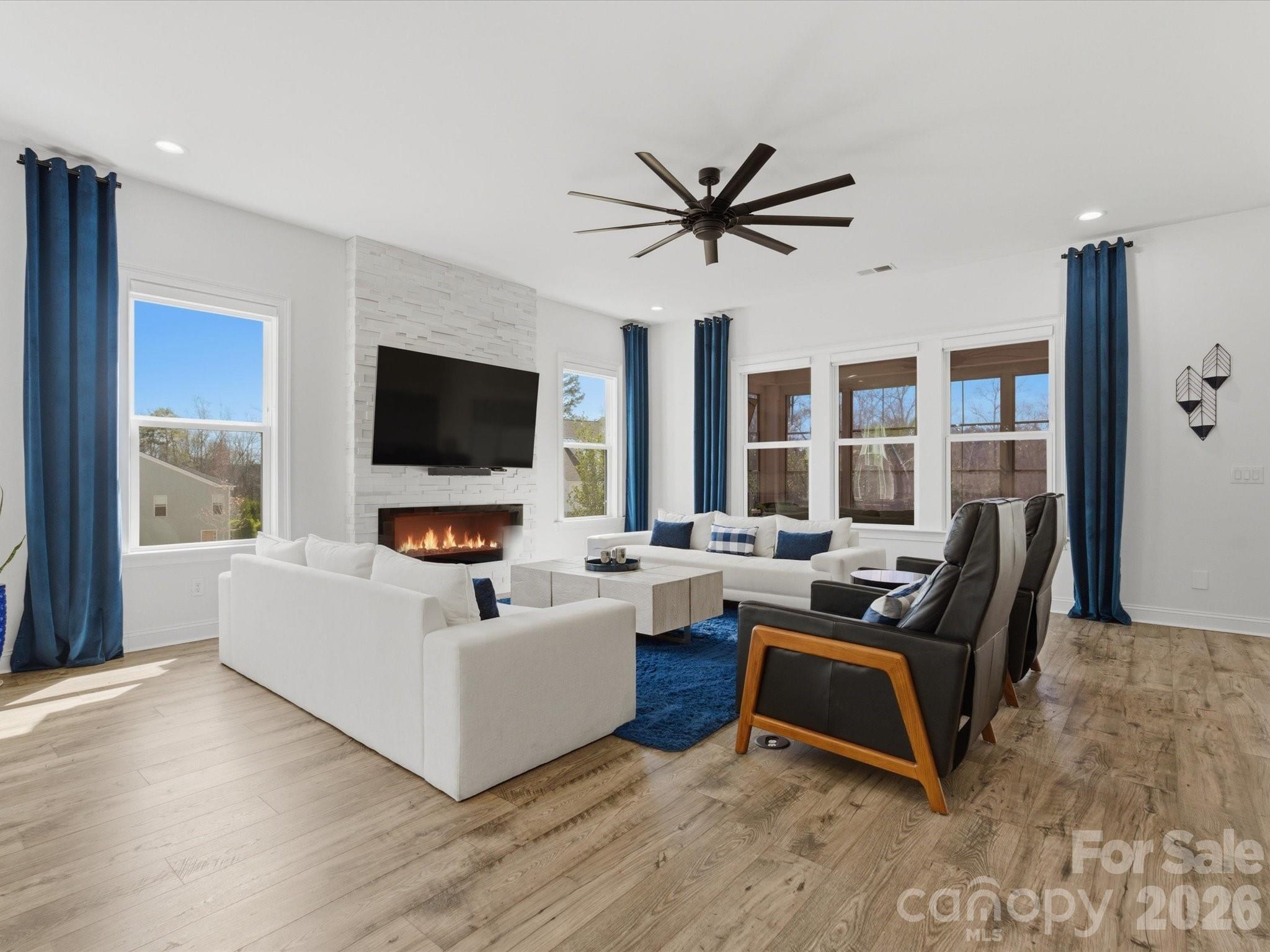 7237 Twelve Mile Creek Road Lancaster, SC 29720 - Photo 7 of 47 a living room with furniture and a flat screen tv