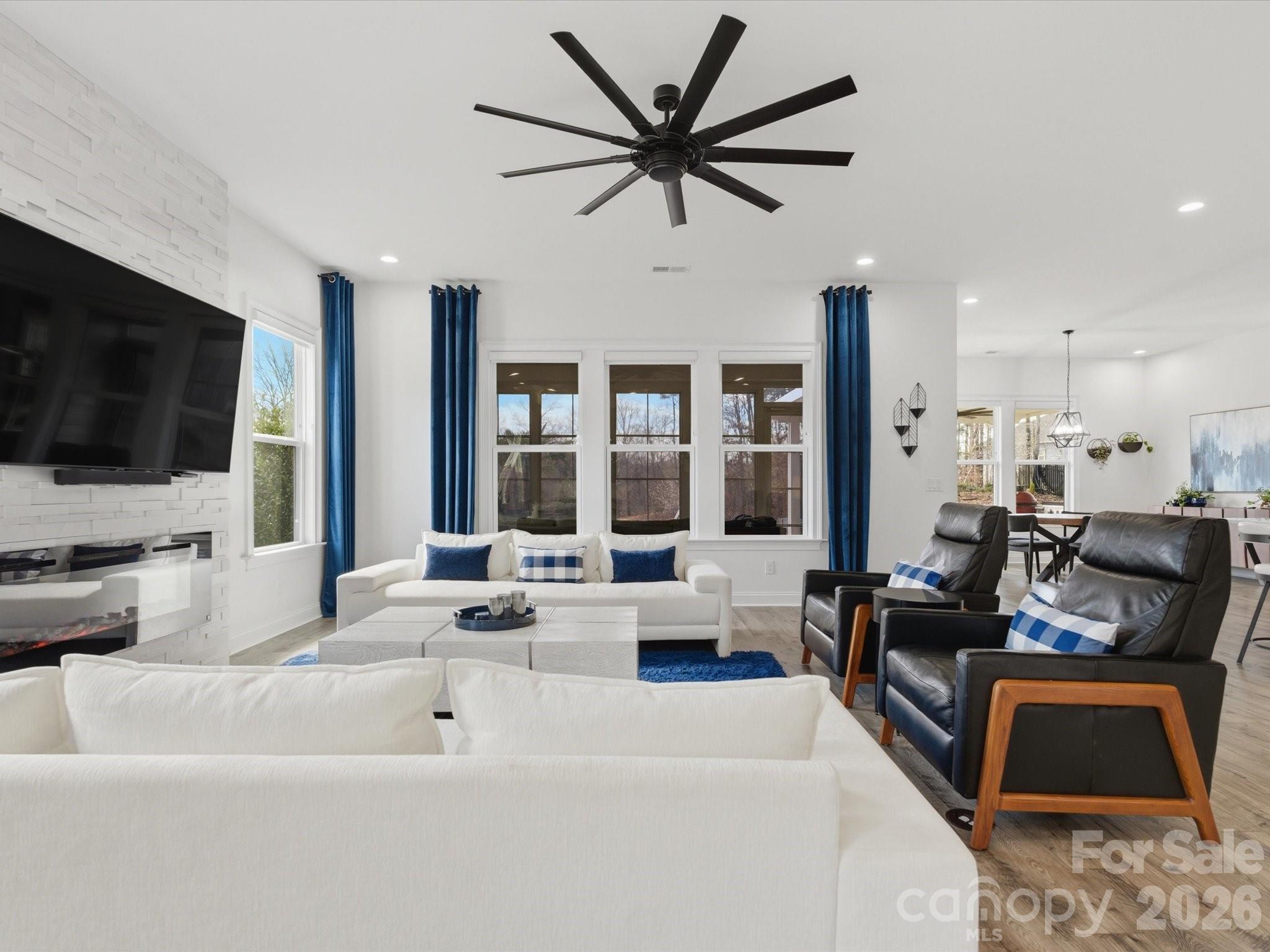 7237 Twelve Mile Creek Road Lancaster, SC 29720 - Photo 9 of 47 a living room with furniture and a flat screen tv