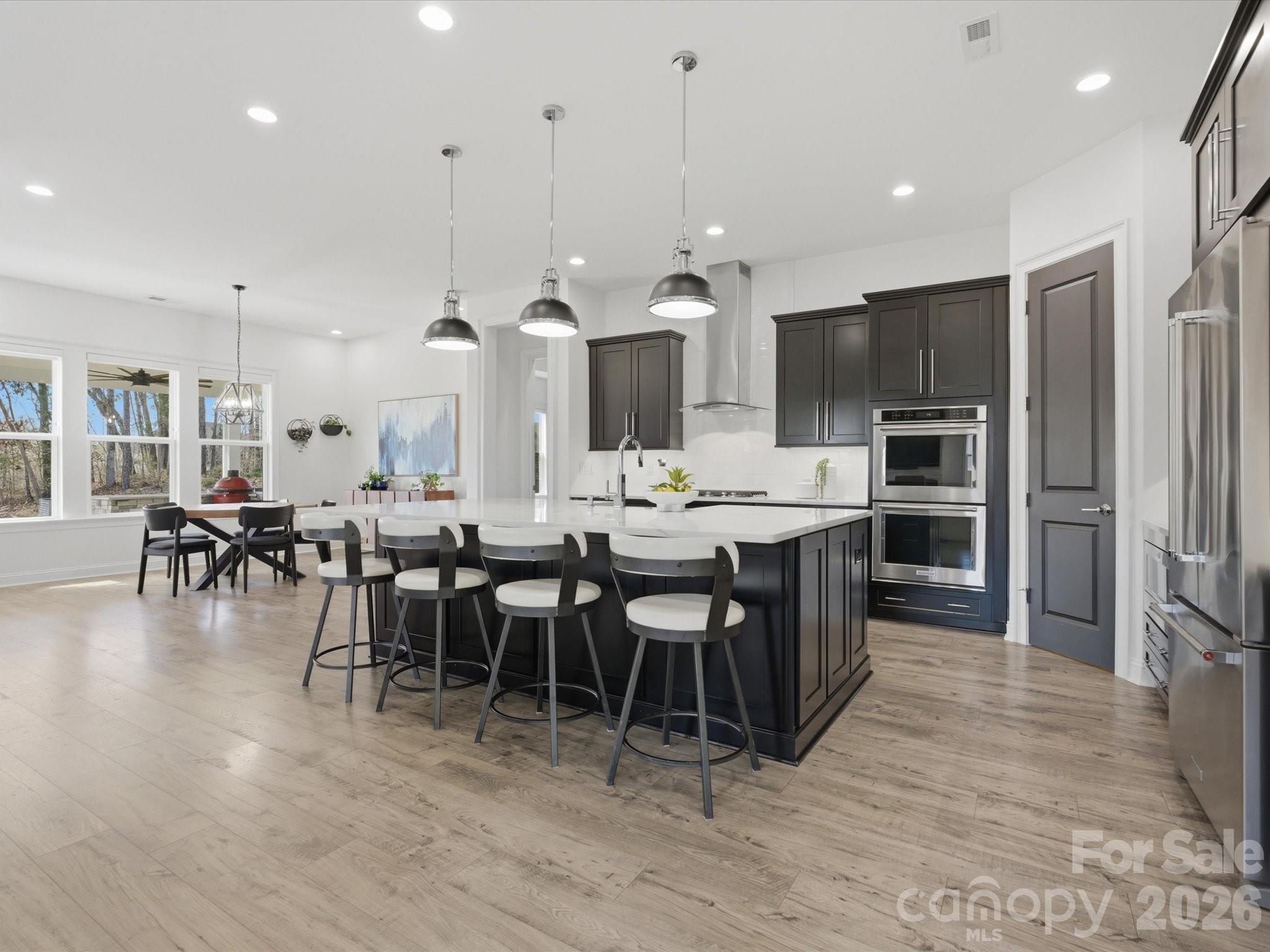 7237 Twelve Mile Creek Road Lancaster, SC 29720 - Photo 10 of 47 a large kitchen with a table and chairs