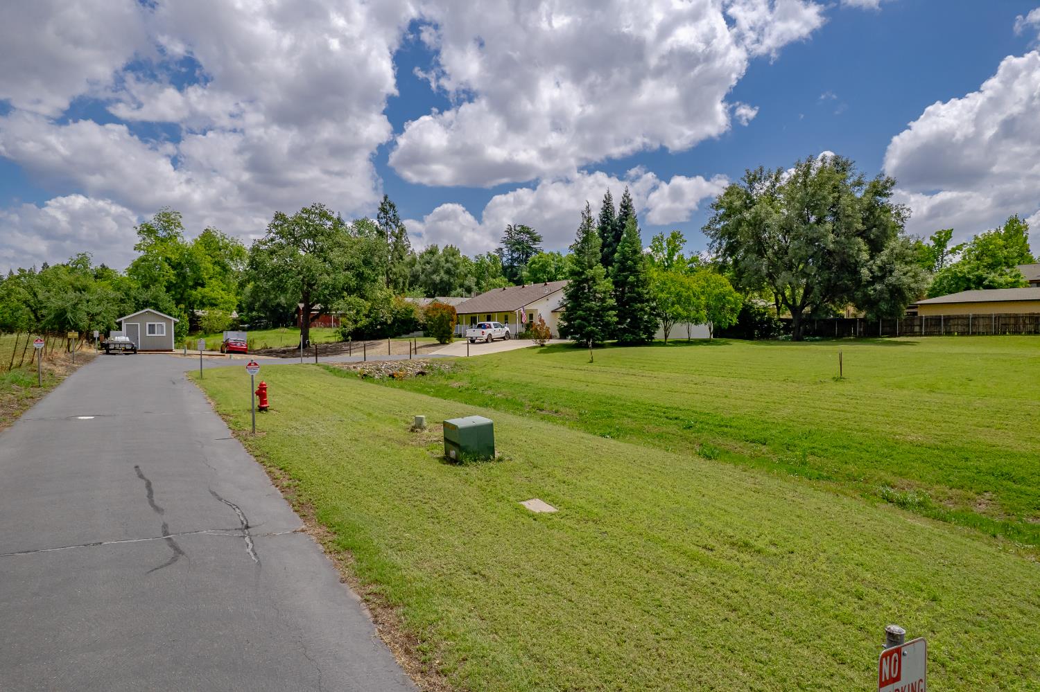 6310 Chestnut Avenue Orangevale, CA 95662 - Photo 18 of 53 a view of a golf course with a building in the background