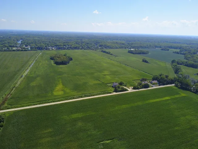 a view of a field with an outdoor space