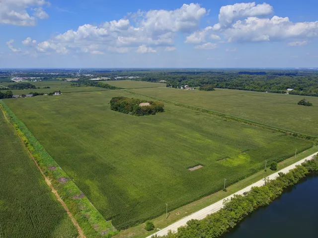 a view of a lake with a big yard