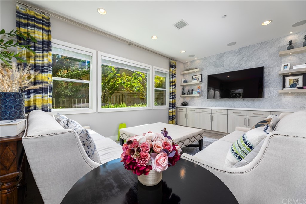 35 Zion Drive Lake Forest, CA 92630 - Photo 11 of 41 a living room with furniture and a flat screen tv