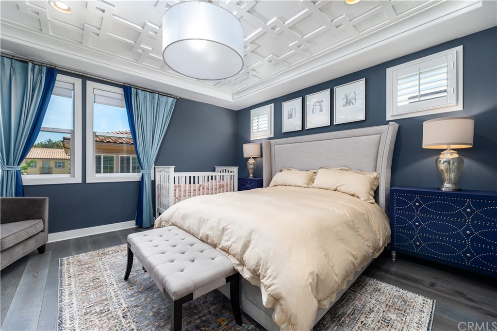 35 Zion Drive Lake Forest, CA 92630 - Photo 22 of 41 a bedroom with a large bed and a window