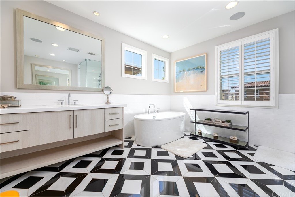 35 Zion Drive Lake Forest, CA 92630 - Photo 24 of 41 a kitchen with a checkered a stove a sink and a cabinets