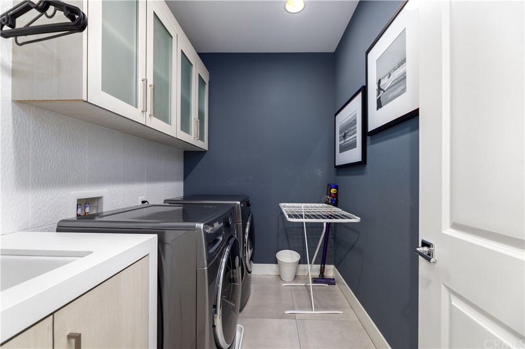 35 Zion Drive Lake Forest, CA 92630 - Photo 26 of 41 a utility room with dryer and washer
