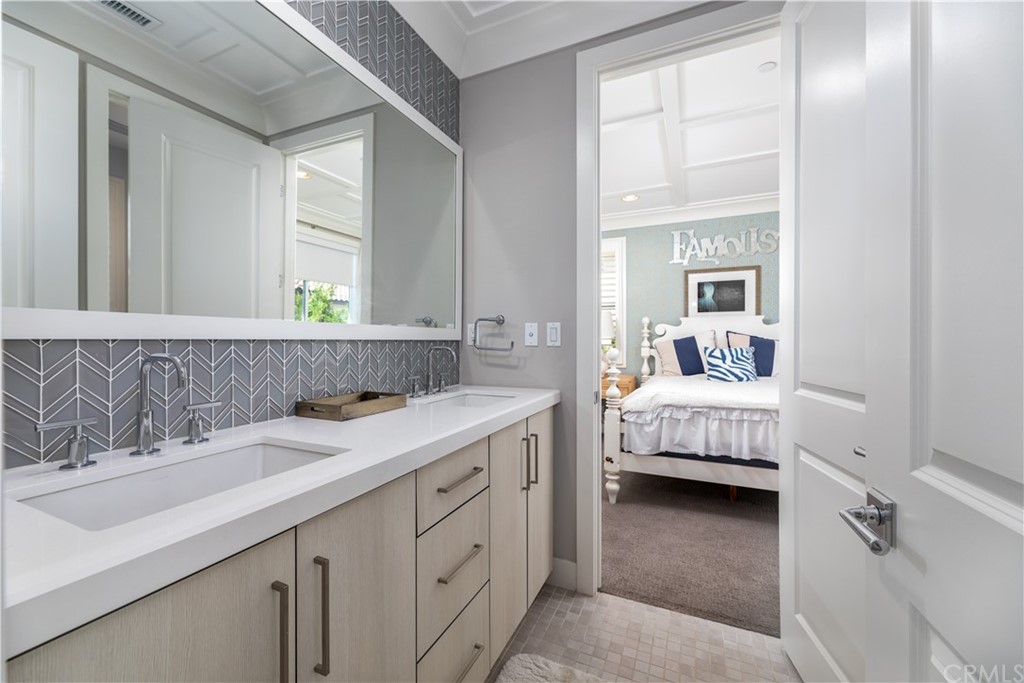 35 Zion Drive Lake Forest, CA 92630 - Photo 35 of 41 a en suite bathroom with a sink and a mirror