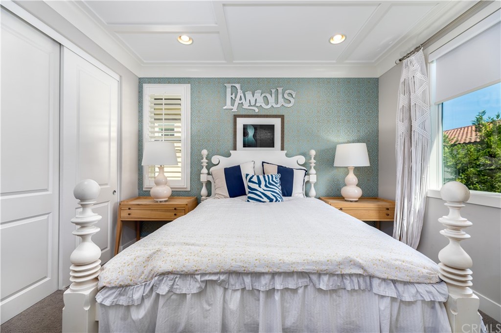 35 Zion Drive Lake Forest, CA 92630 - Photo 37 of 41 a bedroom with a large bed and a window