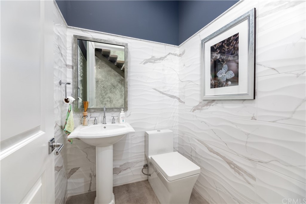 35 Zion Drive Lake Forest, CA 92630 - Photo 6 of 41 a bathroom with a toilet sink and mirror
